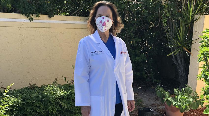 Amy Price, DPhil, a senior research scientist at Stanford Anesthesia Informatics and Media Lab, wears a cloth mask like the ones she and her colleagues tested for efficacy of containing viral particles.