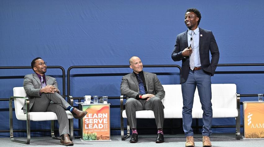 Stanley Andrisse, PhD, MBA, right, discusses his path from prison to college, while James Earl Harris Jr., MD, center, and Antwione Haywood, PhD, left, listen at Learn Serve Lead 2023 on Monday, Nov. 6.