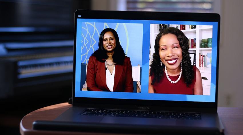 Malika Fair and Isabel Wilkerson appear on a laptop screen