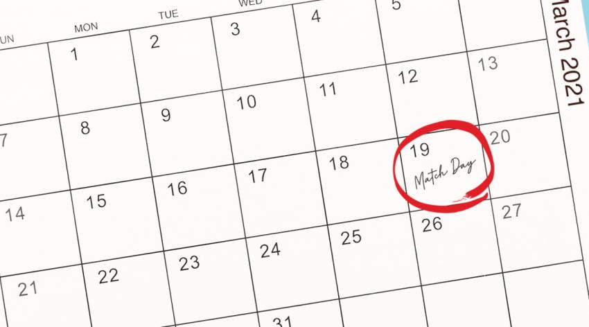 An image of a calendar with March 19 circled in red with "Match Day" written inside