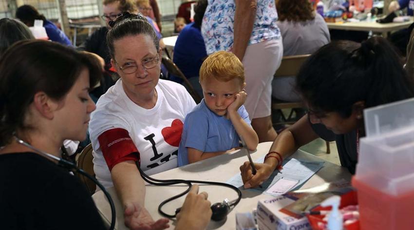 Ruby Partin and her adoptive son visit a free health clinic Wise, Virginia, in 2017.