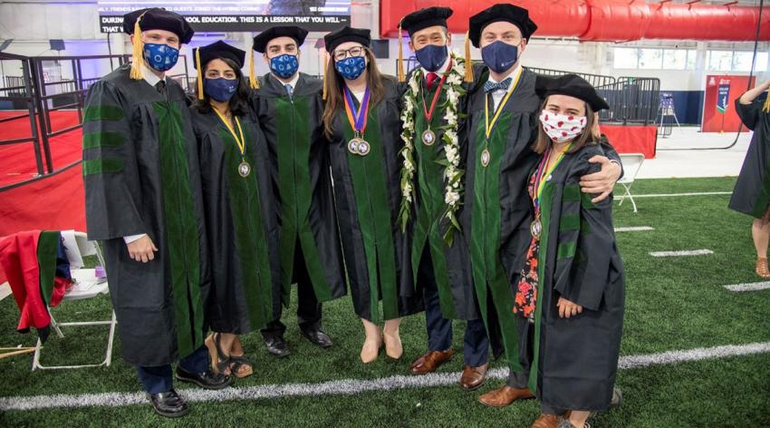 Students at the University of Arizona College of Medicine - Tucson pose after their commencement ceremony on May 14, 2021.