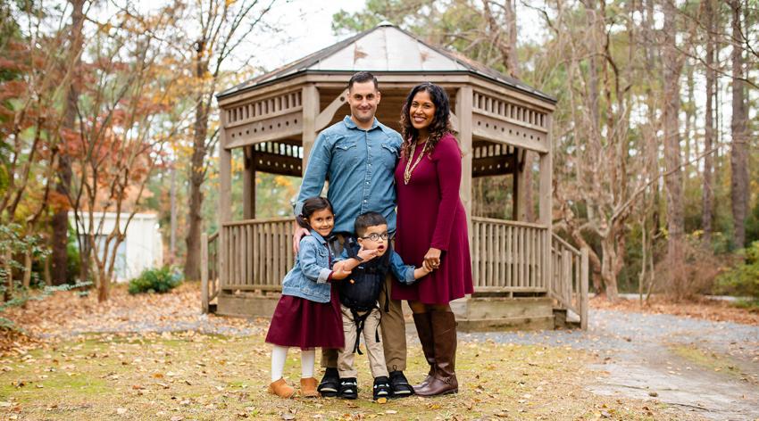 Eric and Nazira Kelly pose with their children, Zara and Ezra in North Carolina.