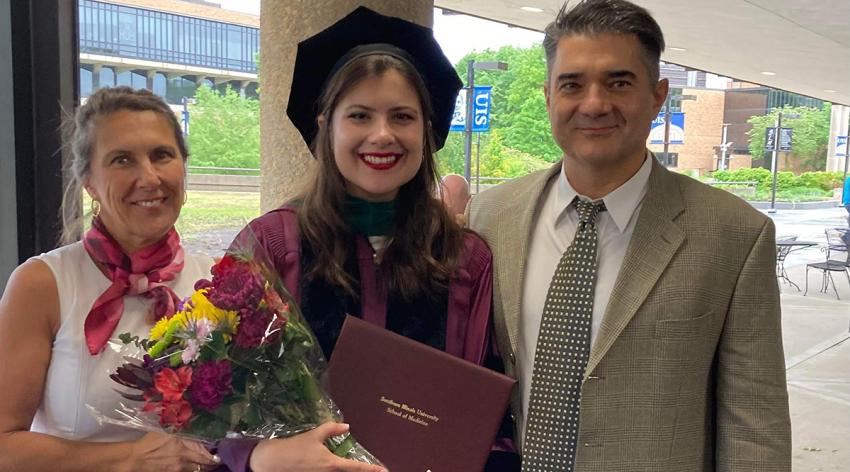 Sophia Matos, MD, poses with her parents after her graduation from Southern Illinois University School of Medicine. She is now an ENT resident at SIU.