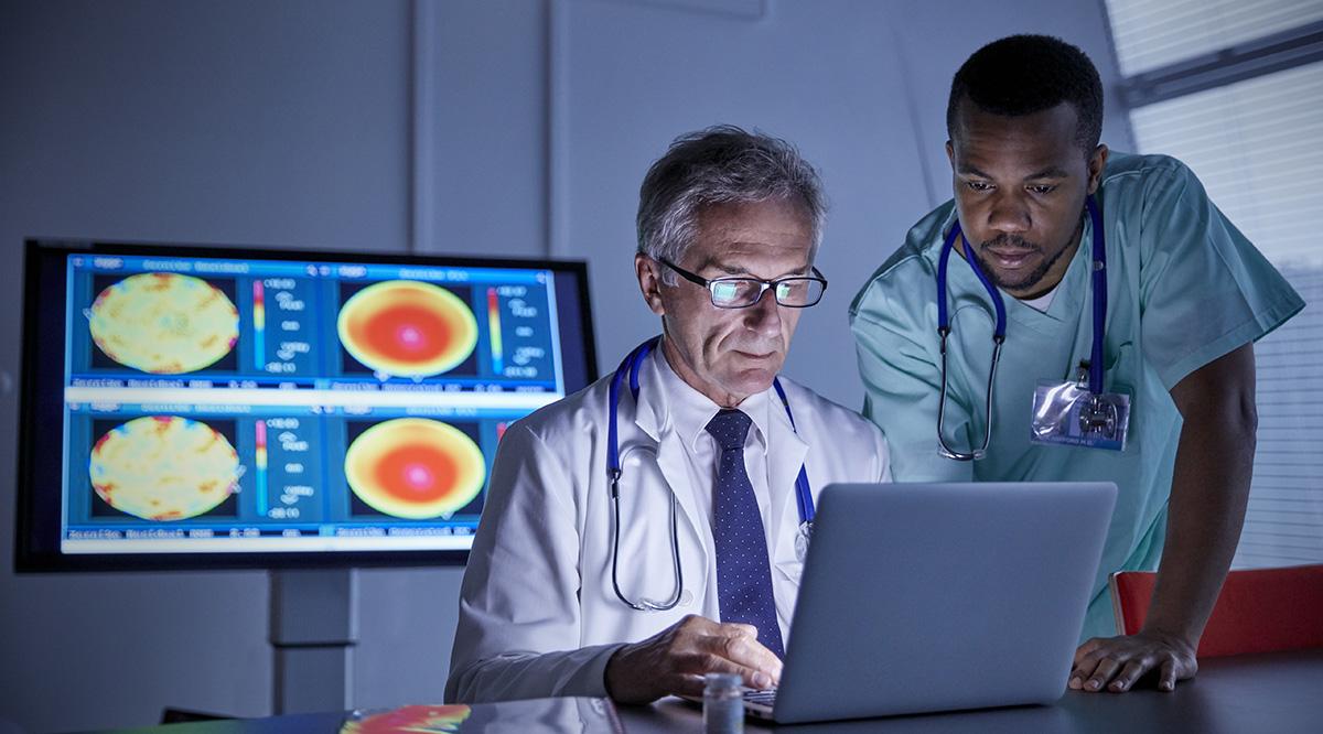 medical doctors viewing scan